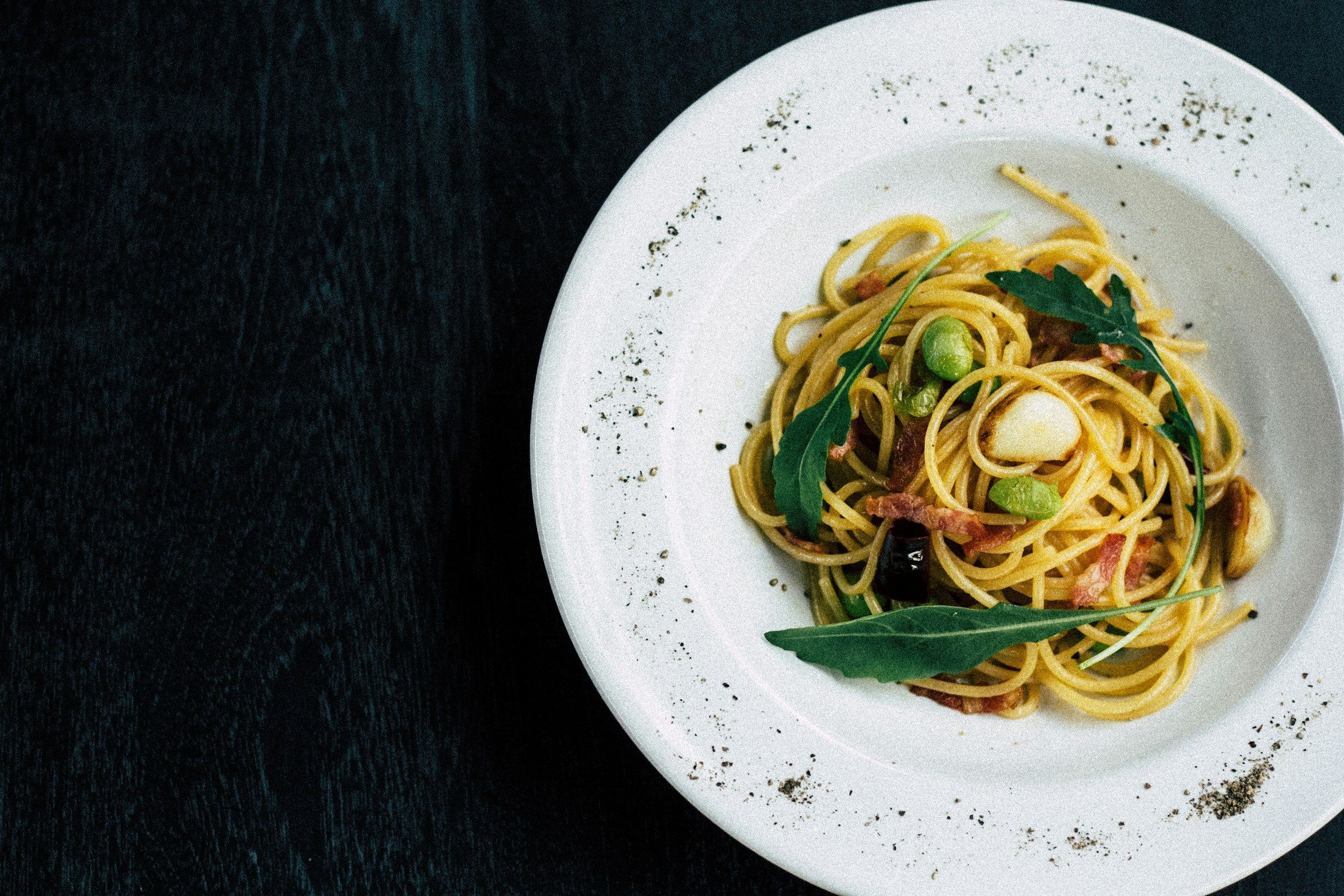 Bowl of spaghetti on a white plate