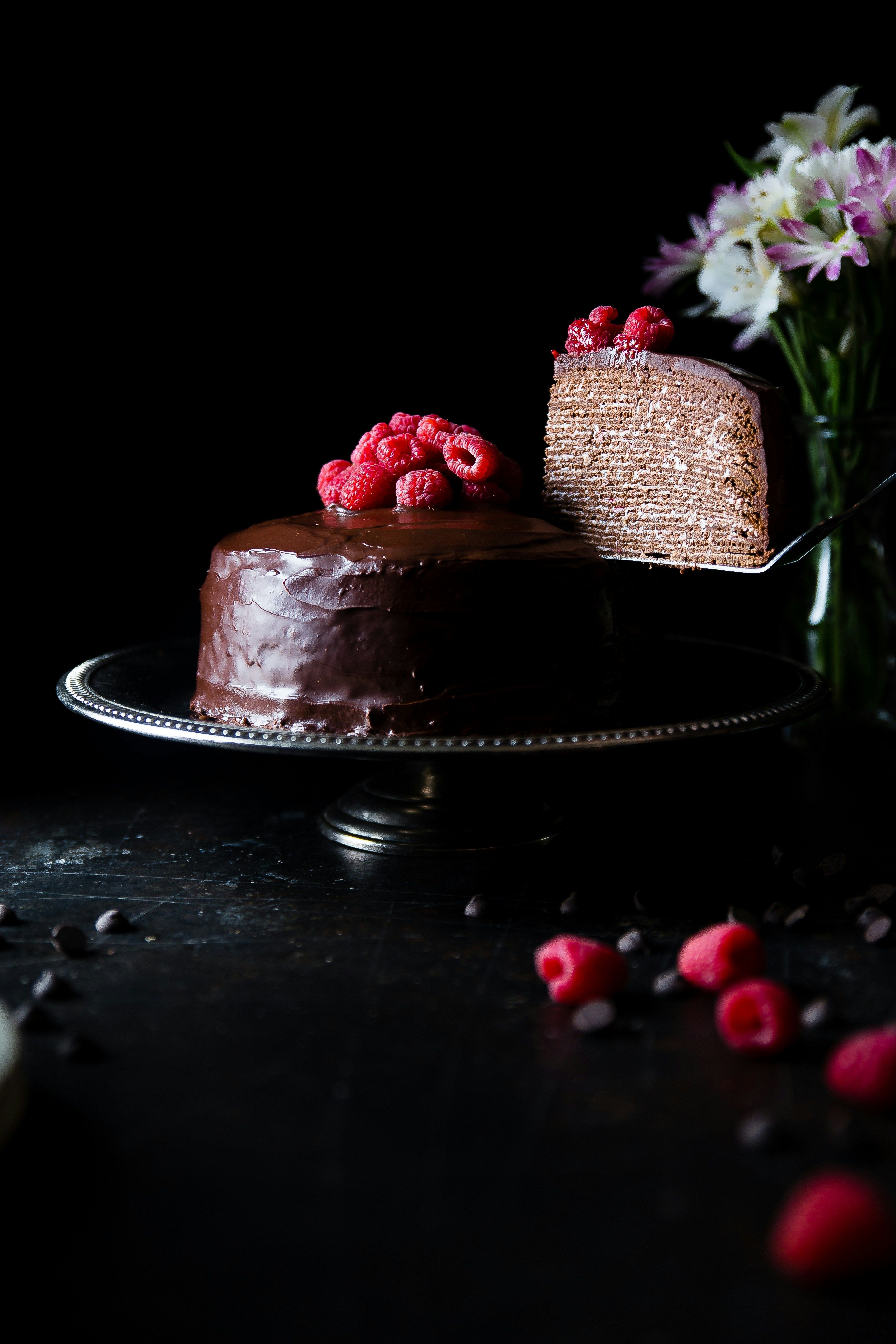 Slice of cake cut out of a chocolate crepe cake